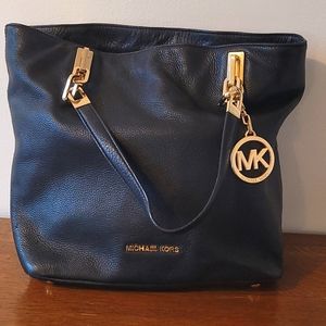 Black and gold Michael Kors leather purse